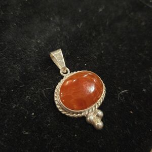 Elegant Silver and Orange Pendant